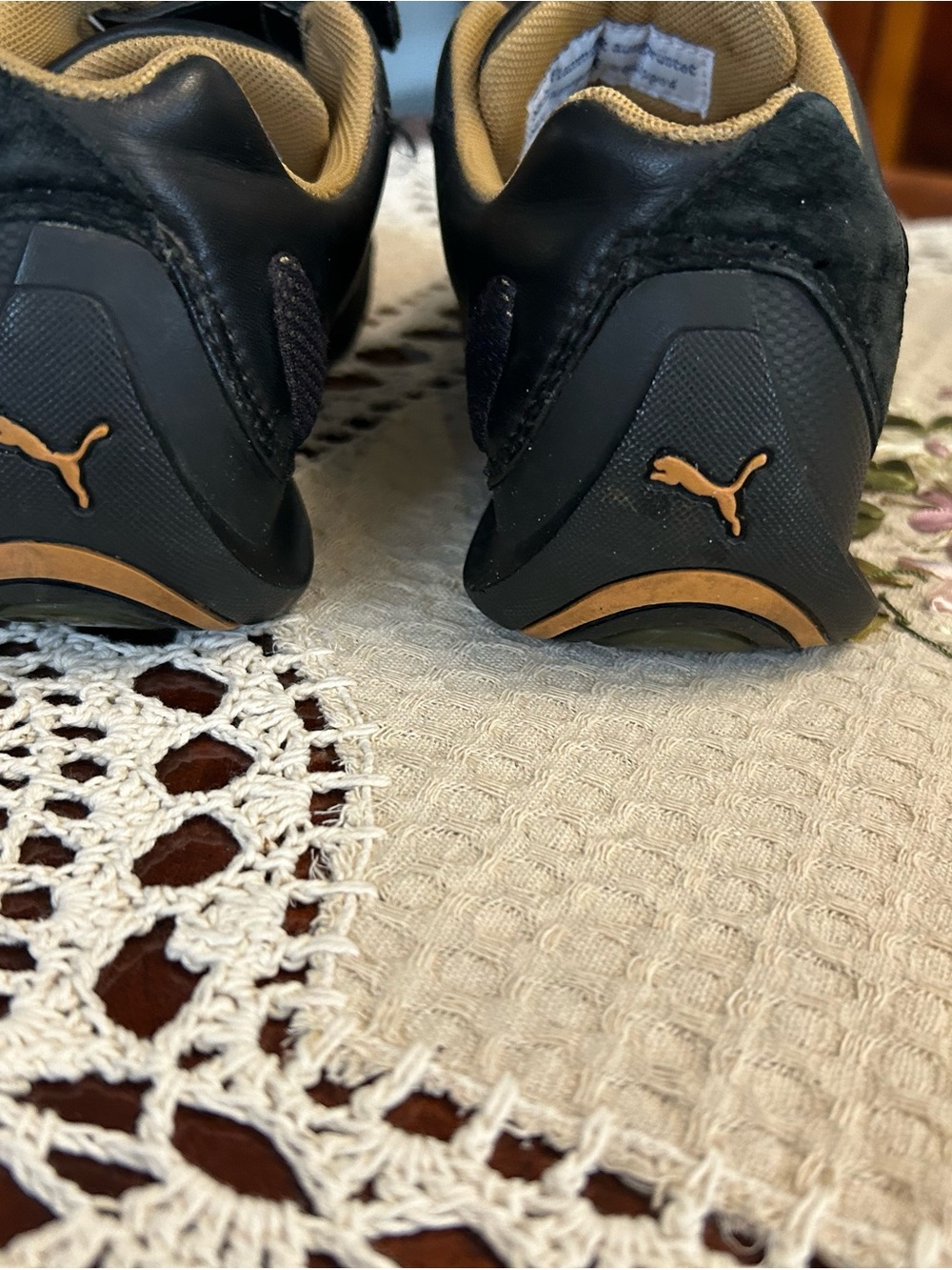 Puma Black and Tan Logo Accent Sneakers